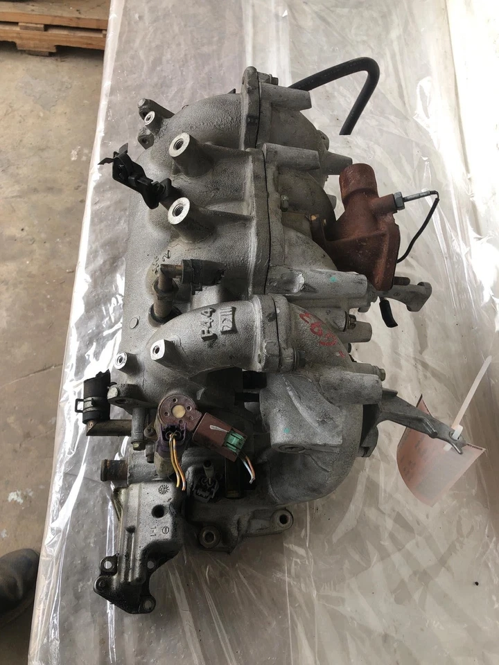 Nissan Altima GLE 1999 motor automático tracción delantera colector de admisión 2,4 L 4 cilindros Foto 1 de 4