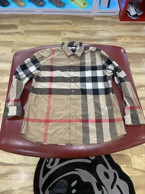 Burberry Check beige con botones para hombre Foto 1 de 4