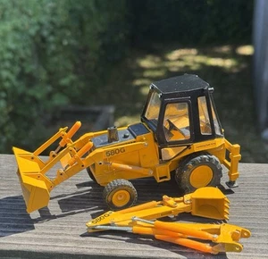 Conrad 580G Construction King Backhoe/Loader 1:35 Scale Germany #2931 - Picture 1 of 13