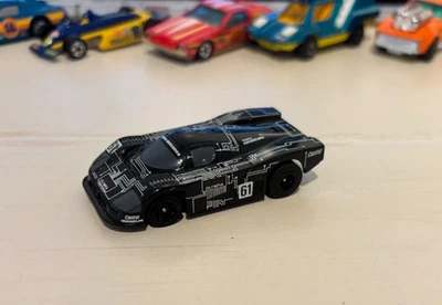 Coche Ranura AFX Tomy Sauber Mercedes Olympia Negro #61 Foto 1 de 4