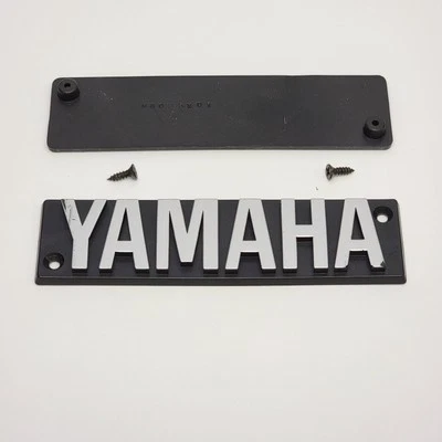 REJILLA METÁLICA DELANTERA ORIGINAL EMBLEMA PLÁSTICO - de/para Altavoz Yamaha Modelo S110H Foto 1 de 4