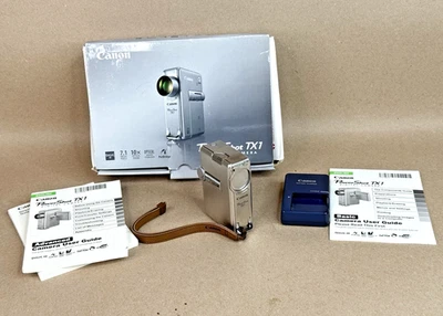 Canon PowerShot TX1 7.1MP Digital Camera with 10x Optical Image Stabilized Zoom/ - Image 1 of 4