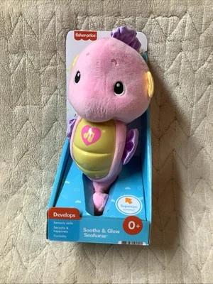 Fisher Price Ocean Wonders calmar y brillar caballito de mar - juguete de peluche musical rosa Foto 1 de 2