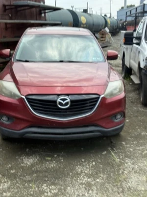 Mazda CX-9 SUV, rojo, vista delantera Foto 1 de 4