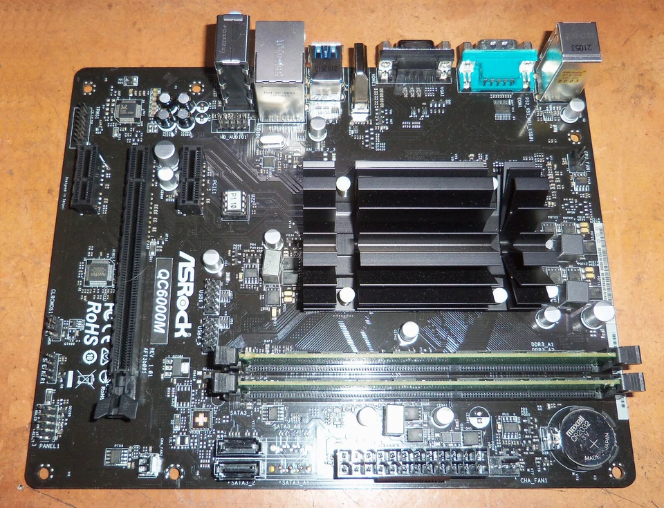 Placa micro ATX ASRock QC6000M AMD E2 6110 USB 3.2 90-MXBBU0 - A0UAYZ + 2 GB RAM - Imagen 1 de 4