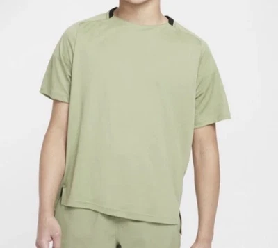 Nuevo con etiquetas Camiseta de entrenamiento Nike Dri-FIT verde talla L para niños grandes (niños) precio de venta sugerido por el fabricante 38 USD Foto 1 de 4