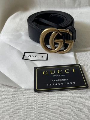 Cinturón Gucci Negro Dorado GG Hebilla Talla 125cm  Foto 1 de 4