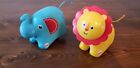 Fisher Price RATTLE N ROLL Rolling Baby Toy Elephant And Lion