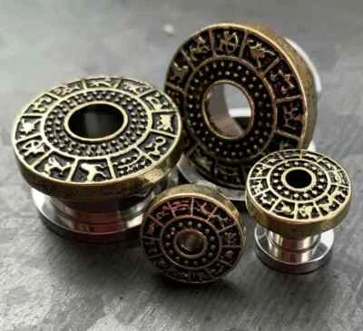 PAR de tapones para túneles de carne de acero superior con tornillos de acero para signos del zodiaco dorados, plateados o bronce Foto 1 de 2