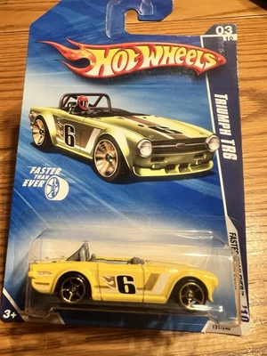 Hot Wheels Triumph TR6 amarillo color KMART EXCLUSIVO 2010 más rápido que nunca Foto 1 de 4