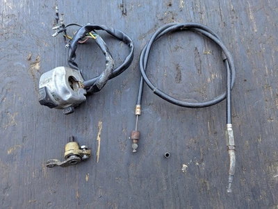 1979 YAMAHA GT80 LEFT HANDLEBAR HEADLIGHT TURN SIGNAL SWITCH AND CLUTCH CABLE - Image 1 of 4