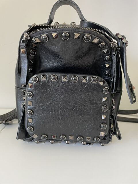 Valentino Black Rockstud Spike VLTN Leather Backpack White Metal Pony-style  calfskin ref.457423 - Joli Closet