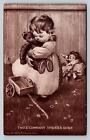 1907 PC Child Little Girl Plays Hugs Teddy Bear Neglects Doll Wooden Toy Wagon