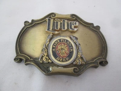 复古 1980 年 Raintree Lite A Fine Pilsner 啤酒带扣 Miller 金色 — 第 1/3 张图片