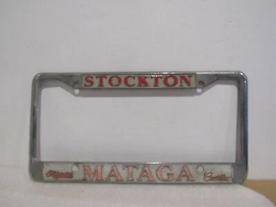 Marco de placa de metal vintage Stockton Mataga Oldsmobile Cadillac concesionario Foto 1 de 2