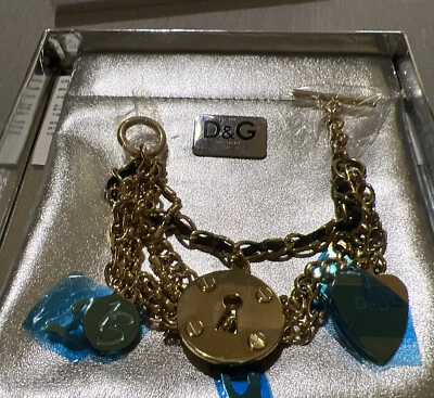 КОРЕНАСТЫЙ DOLCE & GABBANA ЗОЛОТОЙ ЦВЕТ МУЛЬТИ БУСЫ БРАСЛЕТ С БРЕЛОКАМИ - ВЕСЕЛО!  Размер 7 дюймов - Изображение 1 из 4