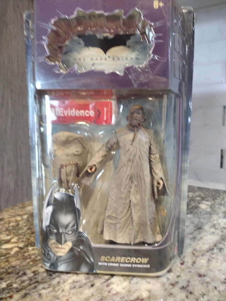 Figura Espantapájaros Batman el Caballero Oscuro con evidencia de escena del crimen sellada nueva Foto 1 de 4
