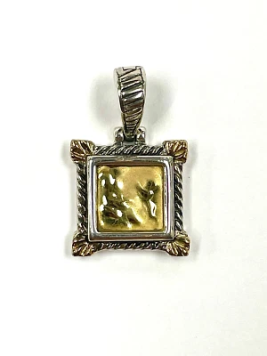 REPOUSSE COLGANTE REALZADOR TAGLIAMONTE PLATA ESTERLINA Y ORO AMARILLO 18K Foto 1 de 4