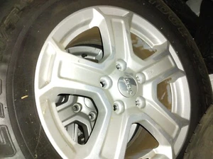 5 Bridgestone Dueler 245 75 r17 tires/Jeep rims.  LOOK BRAND NEW - Picture 1 of 3