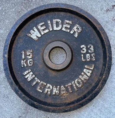 Placa de peso de orificio individual de 2" Weider International 15 kg / 33 libras Foto 1 de 2