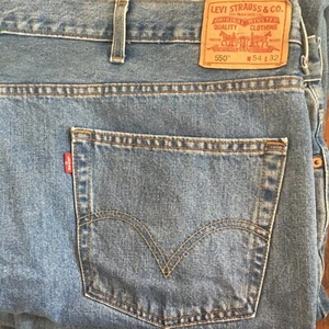 Levi's 54 x 32 550 Relaxed Fit Med Light Wash Denim Jeans - Picture 1 of 5