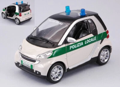 MODELLINO AUTO STATICO NEW RAY SMART FORTWO POLIZIA LOCALE MODELLISMO SCALA 1/24 - Immagine 1 di 4