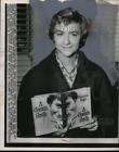 1956 Press Photo Francoise Sagan w Novel "A Certain Smile" at Idelwild Airport