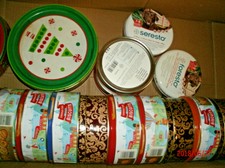 Two dozen plus or minus round covered tins to hold your homemade gifts.
