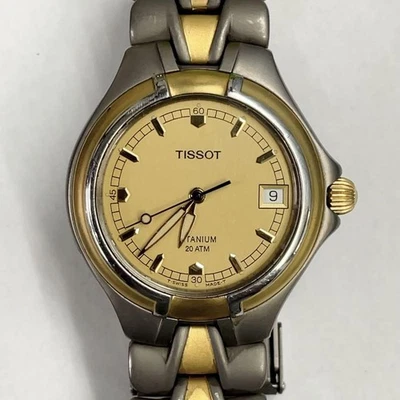 Reloj Hombre Tissot T660 Titanio Oro Plata Cuarzo Fecha 20ATM Hecho en Suiza Foto 1 de 4