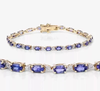 Brazalete de tenis de tanzanita azul de corte ovalado de 7 quilates enchapado en oro amarillo de 14 quilates Foto 1 de 4
