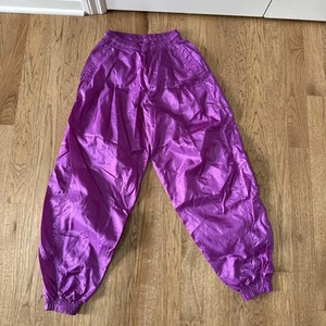 Pantalones cortavientos Nike Elite de nailon pista mujer gimnasio retro pequeños púrpura - Imagen 1 de 13