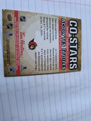 2025-26 tim Hortons upper Deck acolytes co-stars Brady tkachuk/Tim stutzle - Image 1 of 4