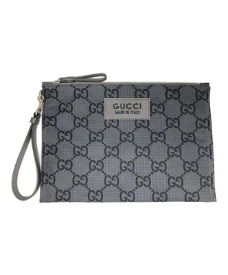 Bolso clutch de lona Gucci GG número de modelo 770662 color gris para hombre casi como nuevo Foto 1 de 4