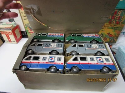 Camión de hojalata gran exhibición de 12 camiones en caja años 50 casi como nuevo fricción Japón Foto 1 de 4