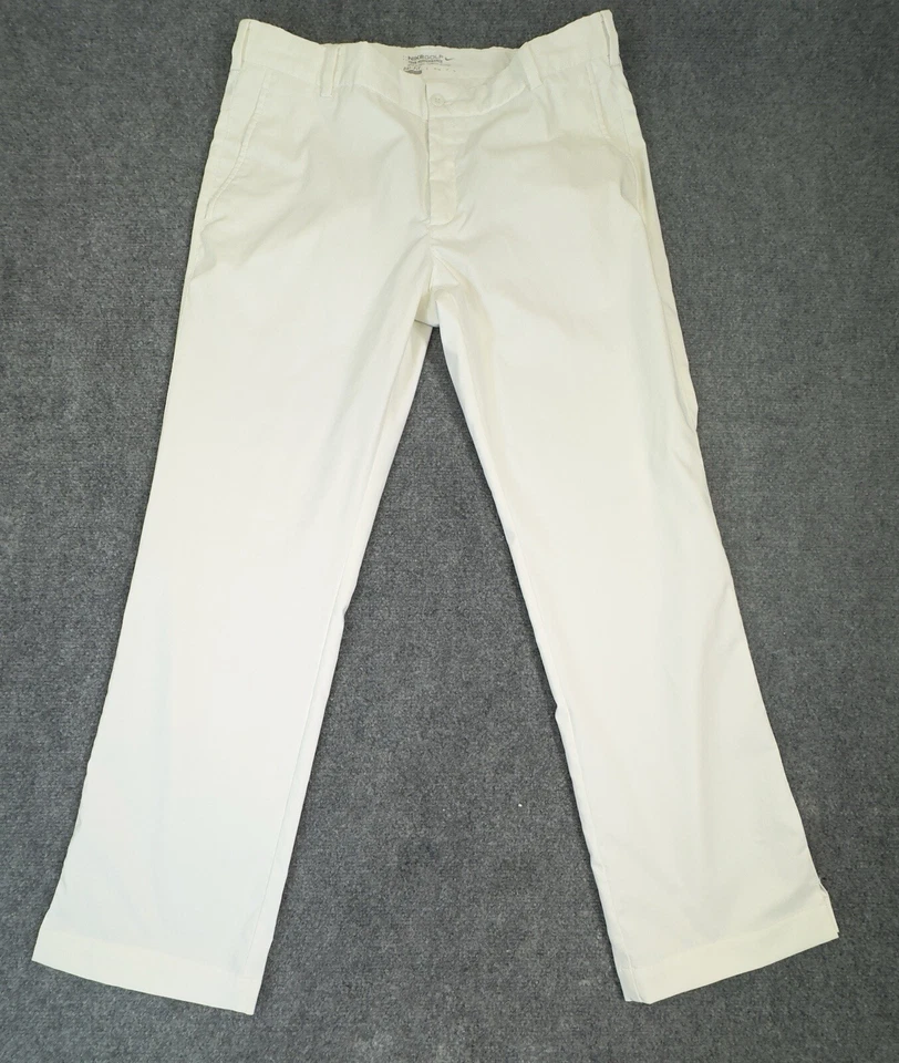 Pantalones Dri-Fit Nike Golf Tour Performance para hombre 34x30 beige crema frente plano Foto 1 de 4