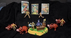 VINTAGE - 1999 “Tarzan” Bundle + Bank + 8 Figures + 1 VHS + 2 DVD’s - *AS IS* - Picture 1 of 17