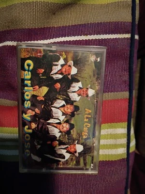 Carlos y Jose -A La Carga( cassette)©️1992  - Image 1 of 4