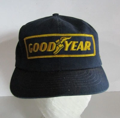Gorra Goodyear $1 en ganador de carreras en Target VI béisbol ajustable azul marino y dorado Foto 1 de 4