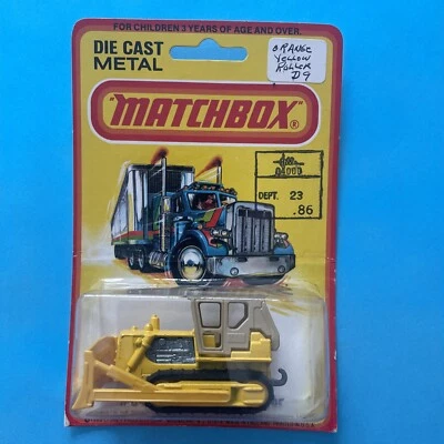 TARJETA SELLADA DE FÁBRICA VINTAGE 1980 MATCHBOX # 64 TRACTOR CATERPILLAR BULLDOZER Foto 1 de 4