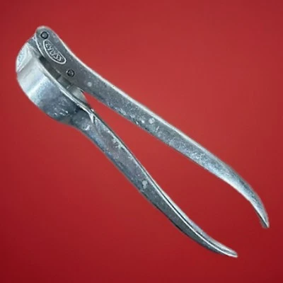 Herramienta de cocina retro de aluminio prensa de ajo hecha en Suiza Zylyss vintage Foto 1 de 4