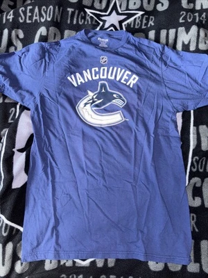 Camiseta deportiva Vancouver Canucks Daniel Sedin 2011 Reebok azul marino talla mediana para hombre Foto 1 de 4
