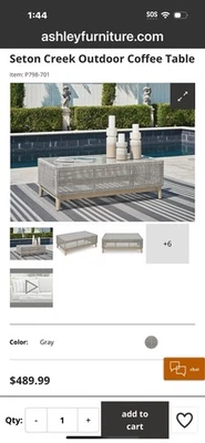 Mesa de centro de exterior Ashley Furniture Seton Creek Foto 1 de 3