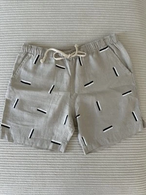 Pantalones Cortos Alex Crane de Lino Para Hombre Medianos Cordón Tostado Negro Blanco Patrón Geométrico Foto 1 de 4