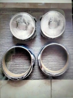 1978 porsche 911 sc... ONE PAIR HEADLIGHTS, BEZELS  - Image 1 of 4