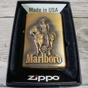 VINTAGE ZIPPO MARLBORO COWBOY ON HORSE BRASS LIGHTER w/BOX - Picture 1 of 10