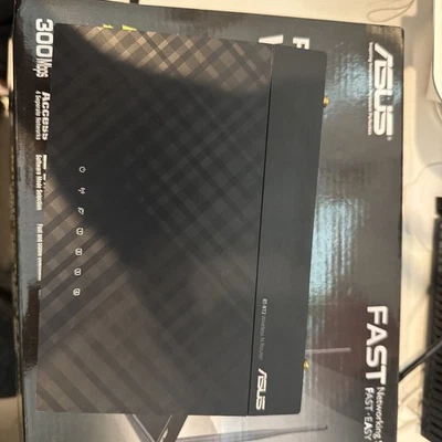 ASUS RT-N12 300 Mbps 4-Port 10/100 Wireless N Router (RT-N12 B1) - Image 1 of 3