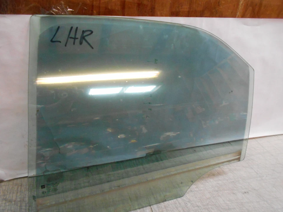 Cadillac CTS 2004 ventana de fábrica puerta trasera izquierda vidrio tintado Foto 1 de 1