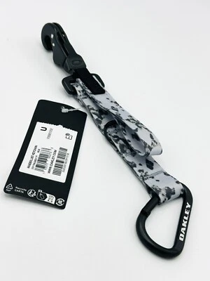 НОВЫЙ OAKLEY БРЕЛОК РЕМЕНЬ КОГОТЬ КАРАБИН СЕРЫЙ КАМУФЛЯЖ МЕТАЛЛИЧЕСКИЙ ЗАЖИМ ВОЕННЫЙ - Изображение 1 из 4