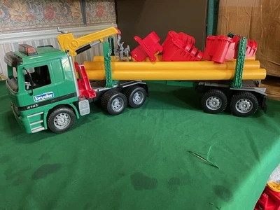 BRUDER, MERCEDES LORRY with PIPE TRANSPORTER and OVERHEAD GANTRY CRANE - Image 1 of 4