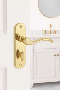 Geneva Bathroom/Room Handles set with Lock on Back Plate in Polished Brass - Picture 1 of 3